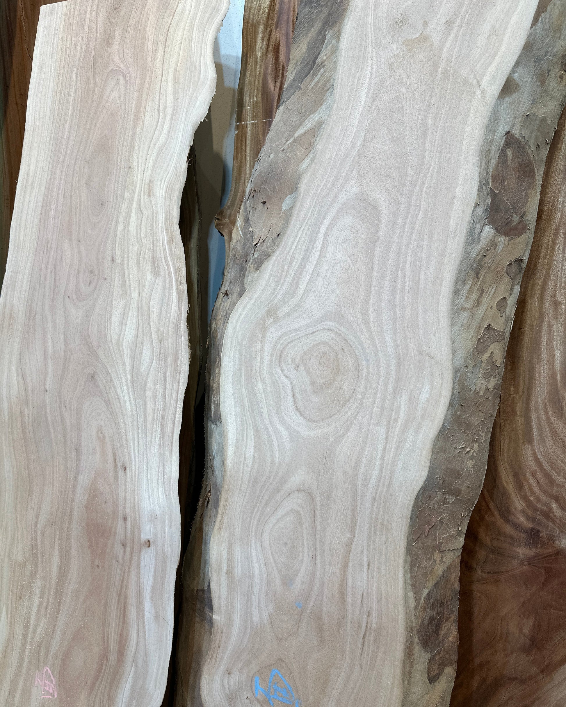 Signature African Mahogany premium live edge wood slab with distinctive natural grain
